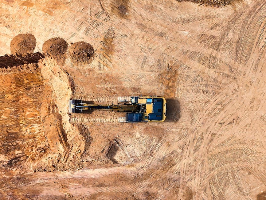 Nivelación de terreno con excavadora para construcción